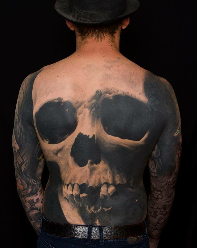 Skull back tattoo