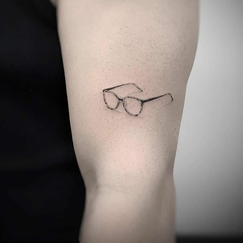 Glasses tattoo