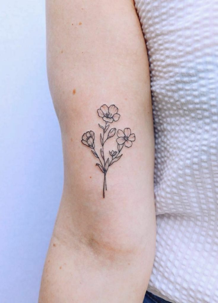 Buttercup flower tattoo