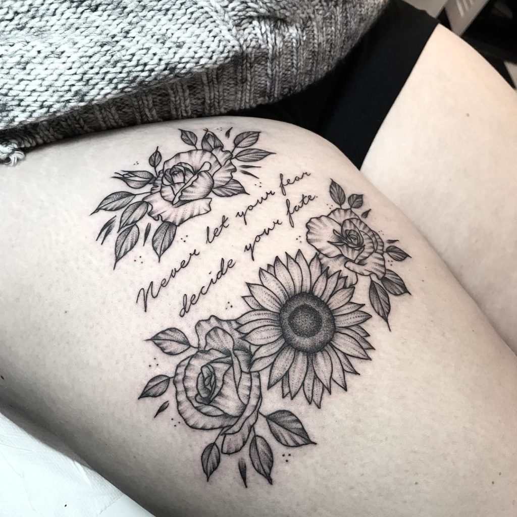 Female thigh tattoos quotes