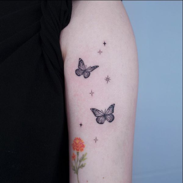 arm butterfly tattoo designs