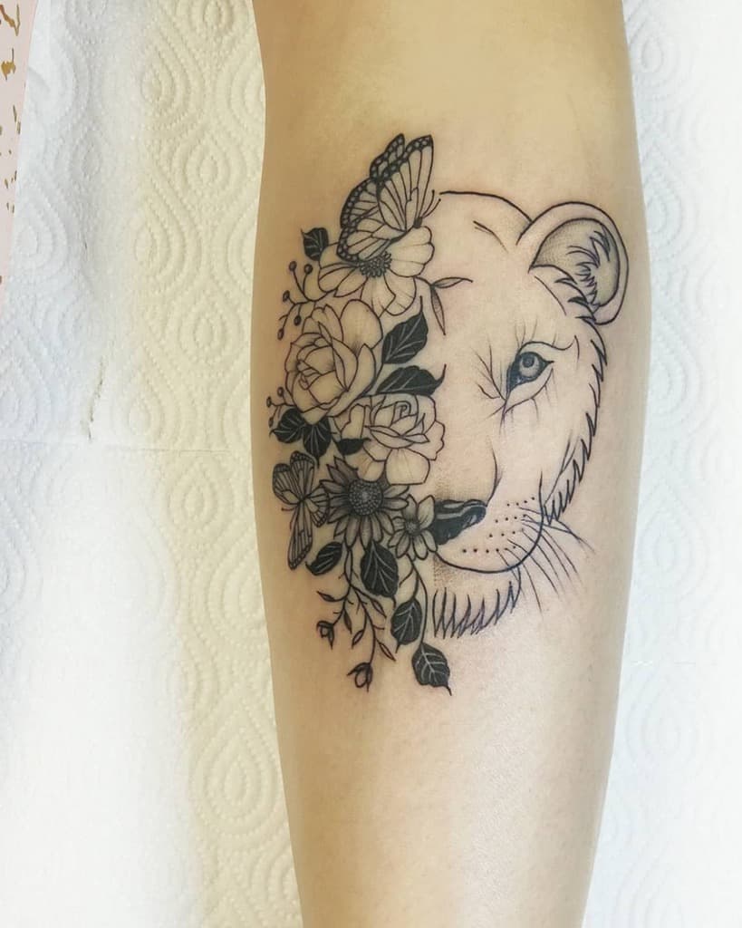 half lion face tattoo