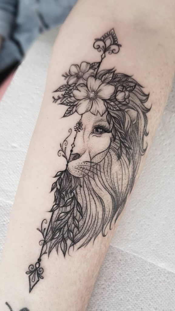 half lion face tattoo