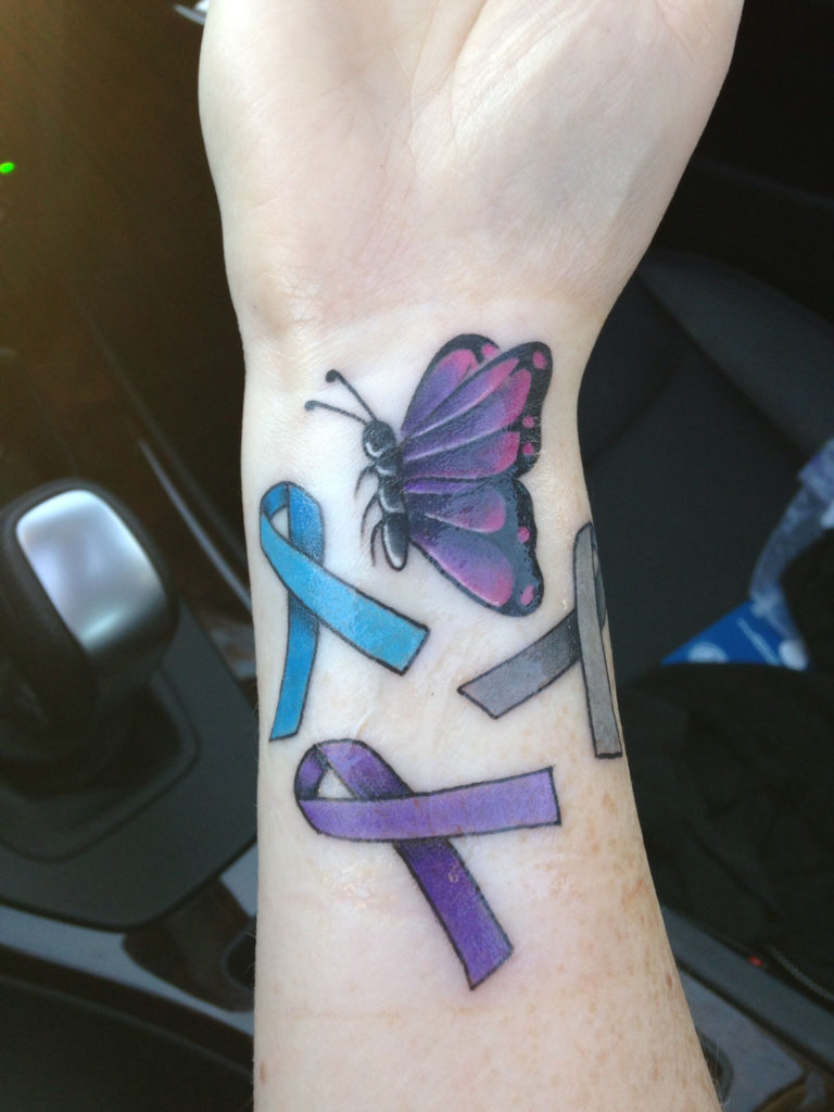 Purple ribbon tattoo