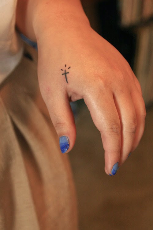 tiny cross tattoo