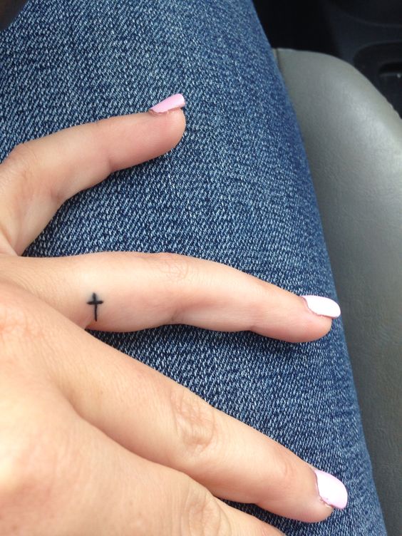 tiny cross tattoo