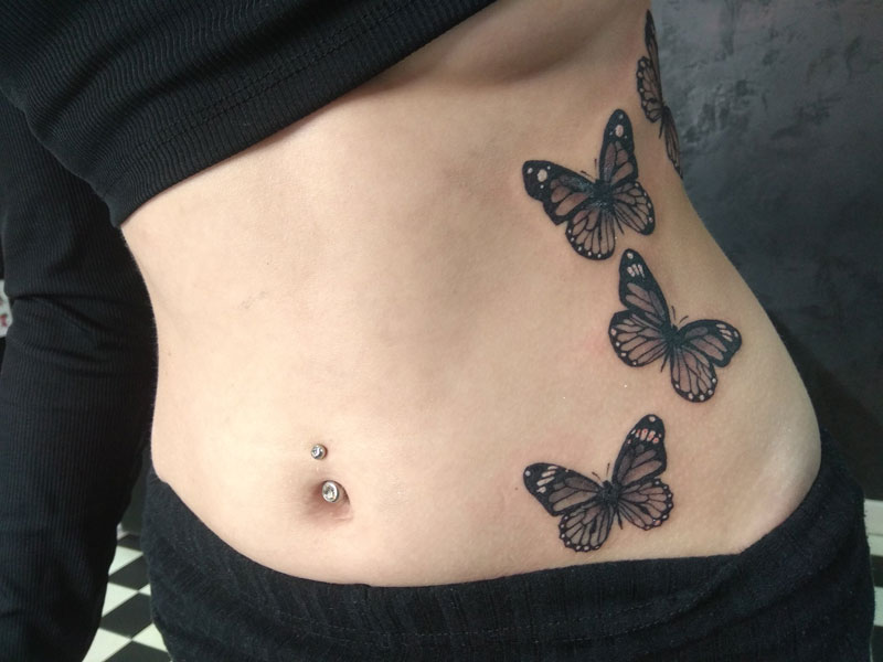 lower side stomach tattoos for females