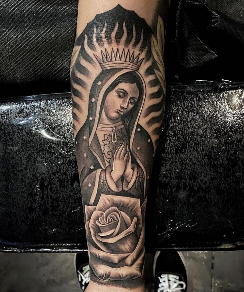 virgin mary tattoo forearm
